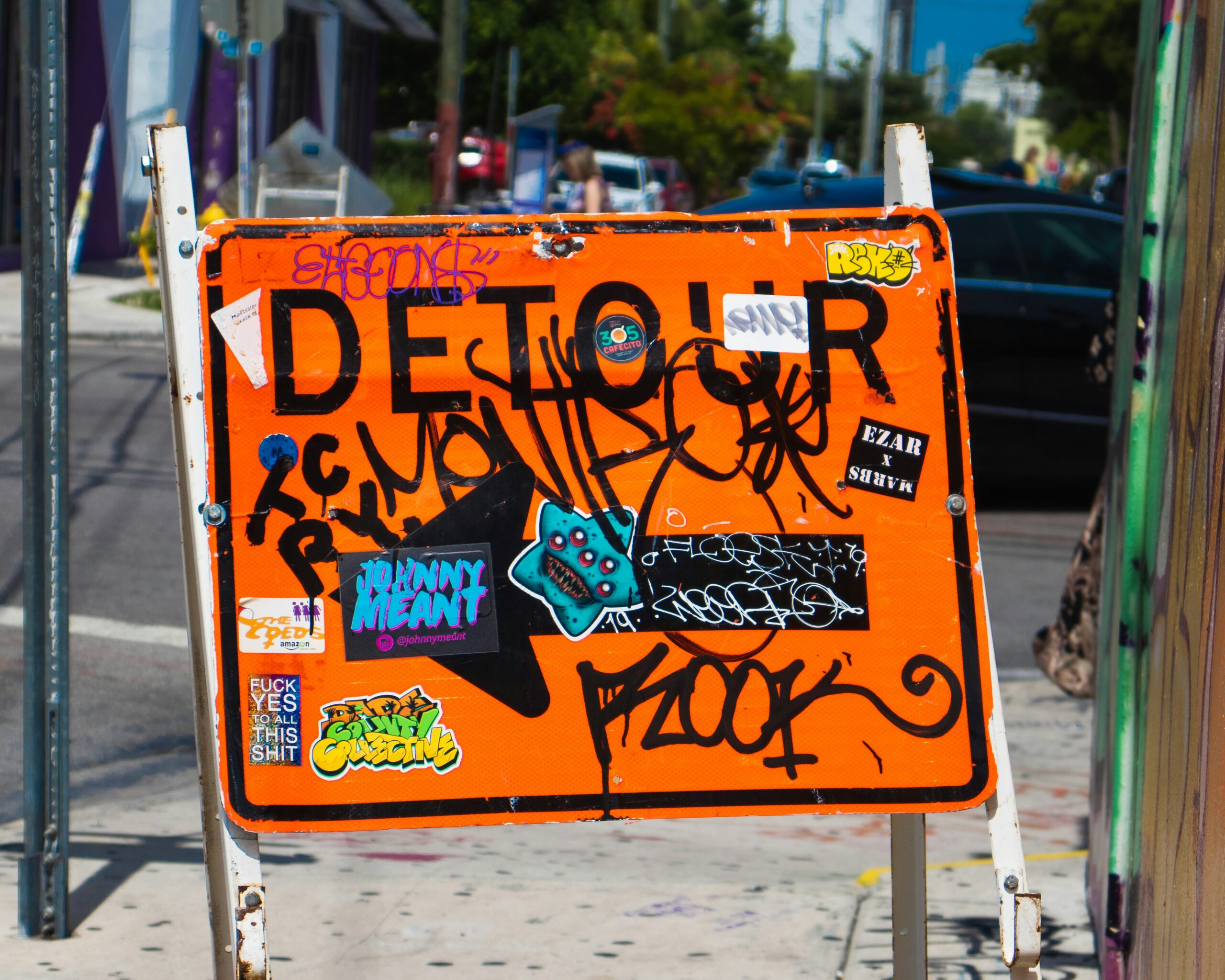detour sign with stickers